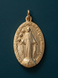 Dije Milagrosa París Oro